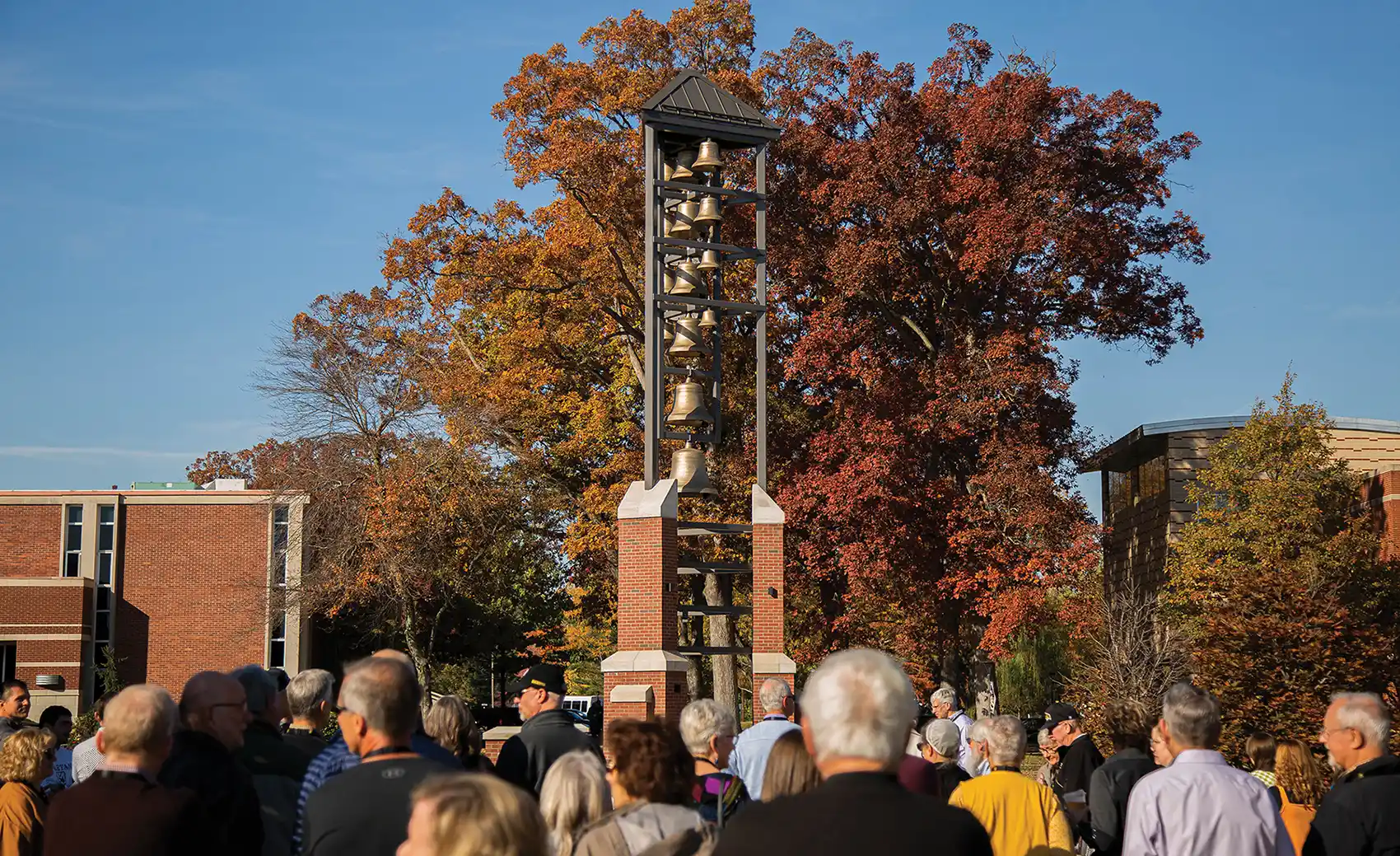 Alumni and students gathered around the Manchester chime during homecoming