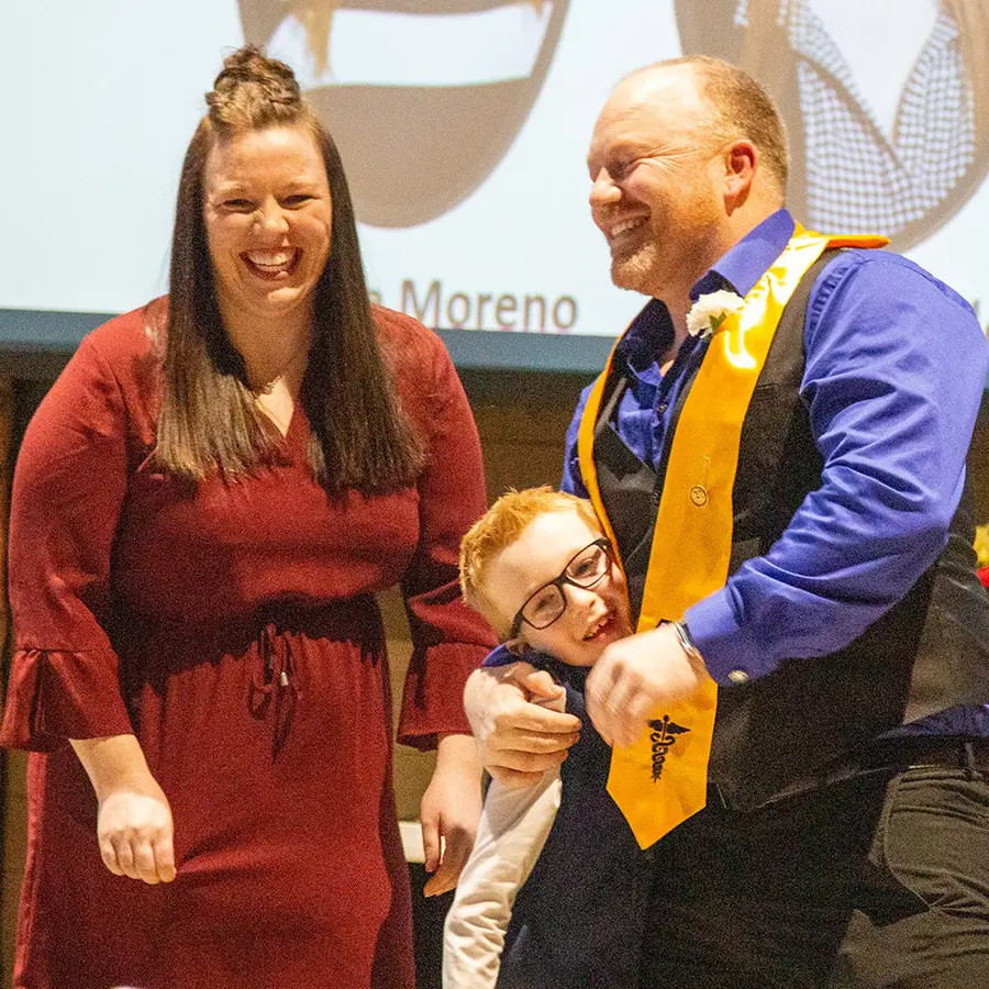 Manchester graduated its first cohort in Accelerated Bachelor of Science in Nursing (ABSN) in December. Here, Joshua Collins ’23 celebrated with family at the pinning ceremony.