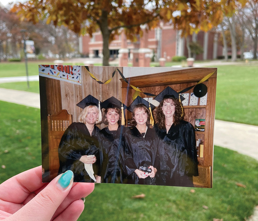 Photograph of Young and 3 friends in their graduation gowns and caps